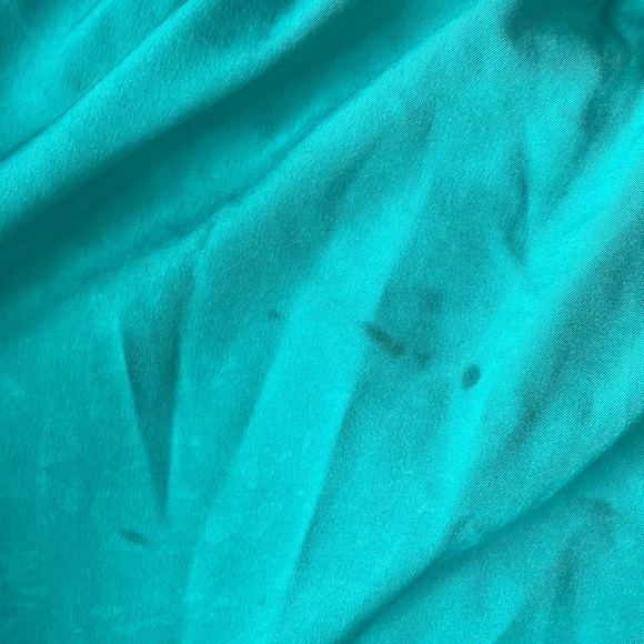Teal nike shorts with pocket in back, small stain on right side - Picture 2 of 4